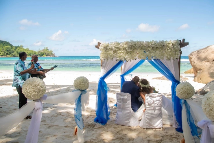 Musicians playing in Seychelles beach wedding