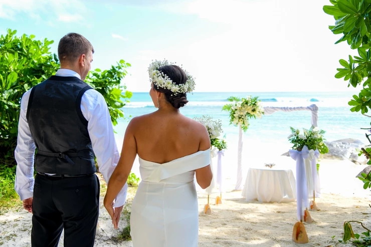 Couple about to walk down the aisle for their Seychelles Beach Wedding